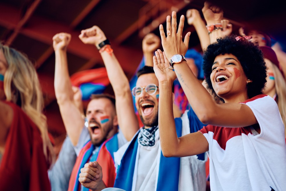Football fans cheering in the stadium